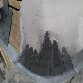 Réalisation d'une abside ardoise sur bandeaux zinc par votre couvreur cordiste à Paris